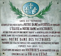 Notre Dame des Vertus à Aubervilliers, plaque historique car Louis XIII venait prier à ND des vertus et faire des retraites au couvent auratorien à Aubervilliers.